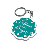 Teal en witte bloemen sleutelhanger met tekst Patience and Prayer voor geduld en gebed